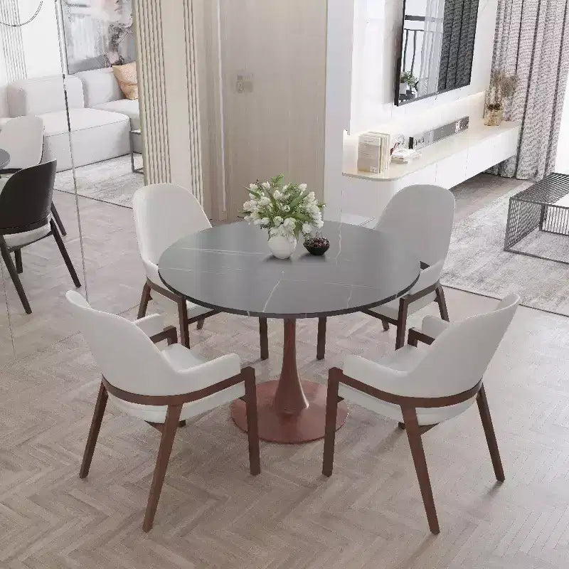 Tavolo da pranzo rotondo Bristol 35 con piano in pietra sinterizzata e base a piedistallo in acciaio noce per cucina e sala da pranzo moderne